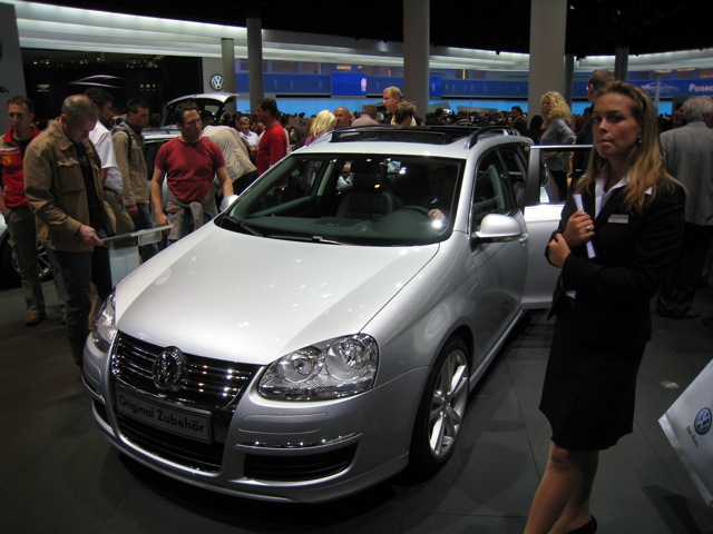 dpa) - Groups of visitors look at the Skoda Roomster at the stand of Skoda  during the IAA international car show in Frankfurt Main, Germany, 9  September 2003. This prototype of a