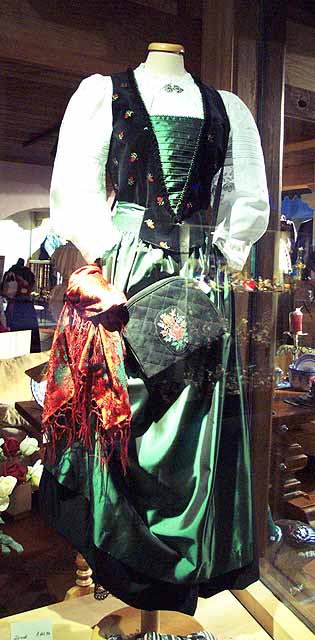 Traditional dress in a window.