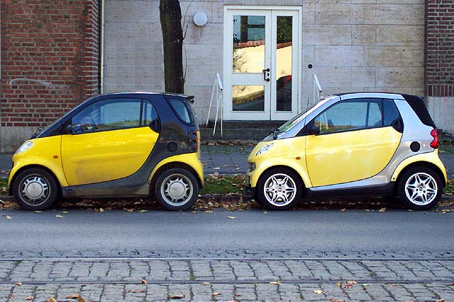 A pair of Smart cars.