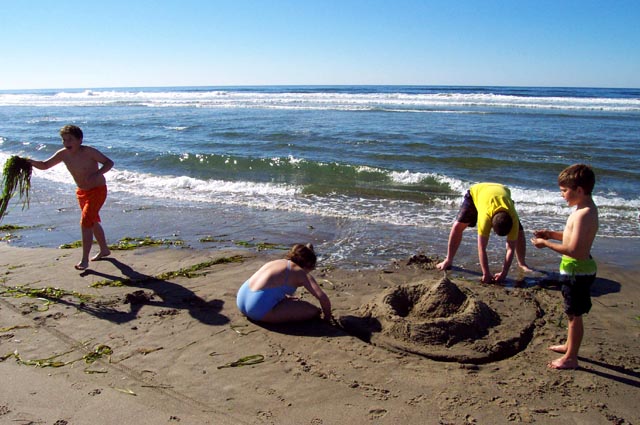 Kids building sand castle