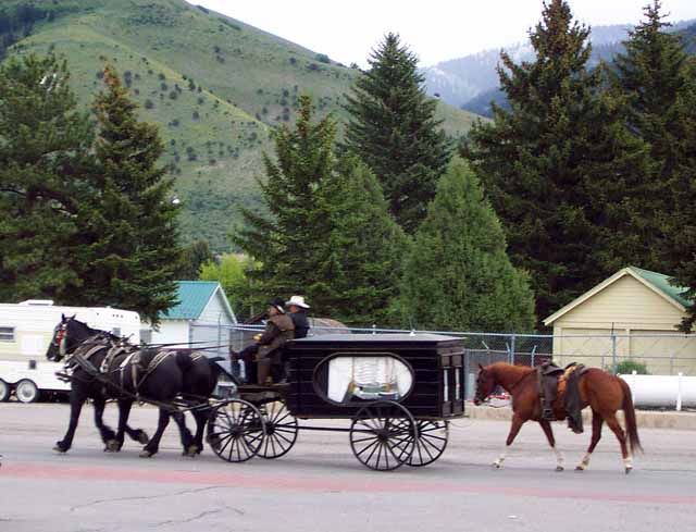 A horse-drawn hearse!